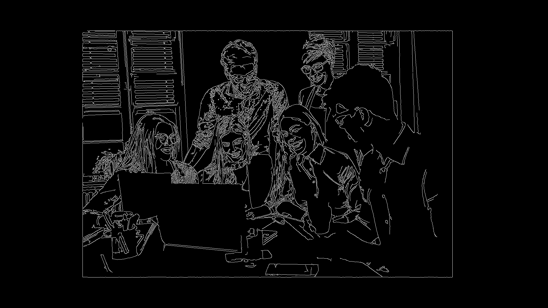 Office workers surrounding a laptop(Grayscale). Source: Canva